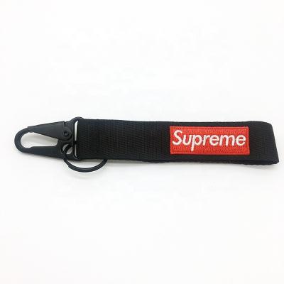 China Twill Don Embroidery Fabric Key Chain High Quality Fancy Custom Embroidered Key Chain for sale