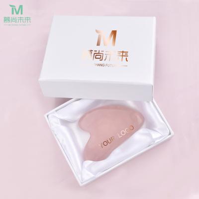 China Amazon hot seller portable/cool/comfortable/double rollers rose quartz crystal heart shape face body massage gua sha tool for sale