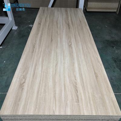 China Excellent Traditional E1 Melamin 18mm Chipboard Faced Particle Board With Low Price For Cabinet Furniture for sale