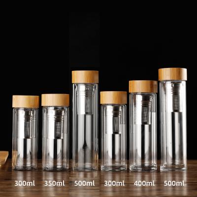 China Custom Logo Leak Proof Double Wall Tea Infuser Bottle Double Insulated Glass Water Bottle With Bamboo Lid 350ml/400ml/450ml Reusable Eco Friendly for sale