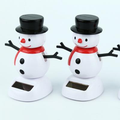 China Polyresin and Plastic Solar Christmas Snowman Decorative Garden Light Santa Claus Solar Light for sale