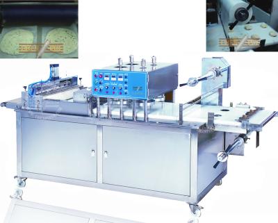 China Paratha dough ball press and film covering automatic lacha paratha dough ball pressing and single packing machine for frozen roti parata chapati making food industry for sale