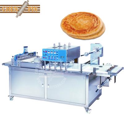 China Paratha dough ball press and film covering automatic paratha dough ball pressing film covering machine for frozen chapati roti thepala making food industries for sale