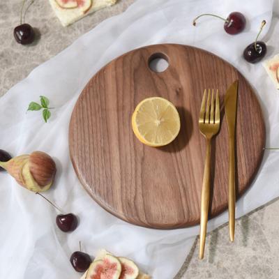 China Viable Rounded Circle Walnut Kitchen Wood Cutting Board With End Texture Large Wood Cutting Board Can Laser Logo for sale