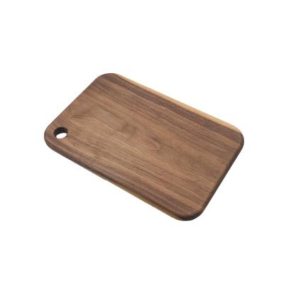 China Durable Walnut Cutout Wooden Handle Kitchen Cutting Board With End Texture Large Wood Cutting Board Can Laser Logo for sale