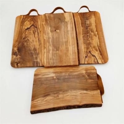 China Sustainable Amazon Olive Wooden Kitchen Cutting Board Natural Olive Dishes With Natural Sides for sale