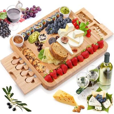 China Disposable Bamboo Cheese Board Cheese Board 4 Piece Set Dinner Chopper With Two Drawers To Order for sale