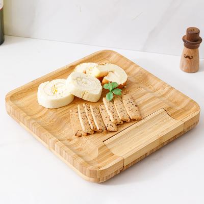 China Disposable North American Style Square Bamboo Cheese Board With 4 Piece Cheese Knife Set for sale