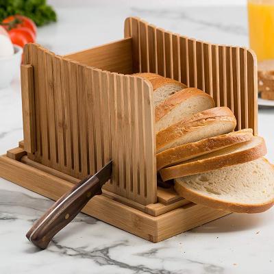 China Sustainable Bamboo Bread Slicer with Knife - Cutting Guide for Homemade Bread, Cakes, Bagels - Foldable and Compact with Crumb Tray for sale