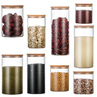 China Low MOQ High Quality Transparent Borosilicate Glass Bamboo Food Cup Jars With Lid for sale