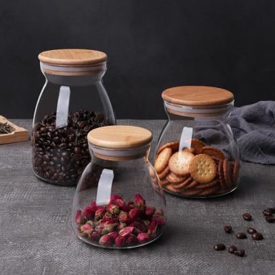 China Factory Food Low MOQ 500ml 100ml Large Stain Clear Glass Tea Nuts Storage Jar for sale