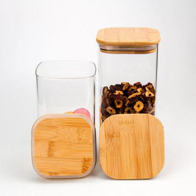 China Food Plant Design 500ml 800ml Square Pantry Glass Storage Jar With Cork Top for sale