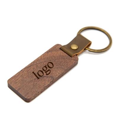 China Eco - Friendly Wooden Key Chain Blank Handcrafted Wood Craft Solid Wood Keychain for sale