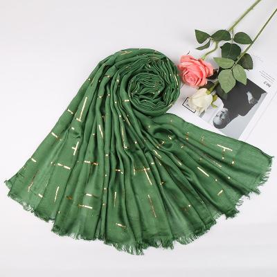 China Long Waist Summer Arrival Madame Gold Stamping Malaysia Cotton Hijab Scarf With Tassels for sale