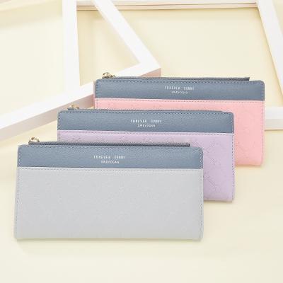 China Waterproof 2022 Designer Wholesale Custom Leather Long Lady Purses Women Purses and Wallets Tassel Card Holder Handbags for sale