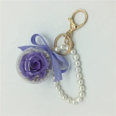 China Wholesale Hanging Decoration Preserved Roses Flower Ball 5cm Key Chain Purple Rose Color With Pear On Sale for sale