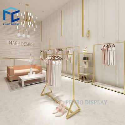 China Display Racks Luxury Design Stainless Steel Clothing Store Furniture Clothing Store Display Shelves for sale