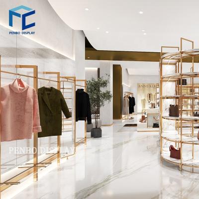 China Display racks custom shop furniture metal gold clothing rack display rack for clothing store for sale