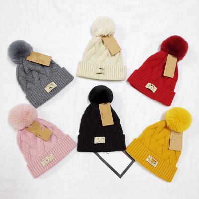 China COMMON women winter beanie fur ball pom poms hat for women girl's hat knitted brand new thick female beanies hat beanies for sale