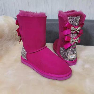 China Women's Breathable Luminous Classic Diamond Glitter Bling Stone Snow Boots Fluorescent Winter Boots With Two Bows for sale