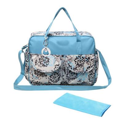 China Fashionable Diaper Bags Blue Floral Top Handle With Diaper Pad All Over Print for sale