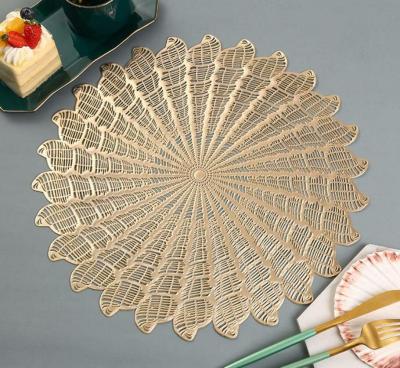 China 2022 Stocked PVC Place Mat Conch Sea Snail Whelk Design Gold Christmas Wedding Table Decoration for sale