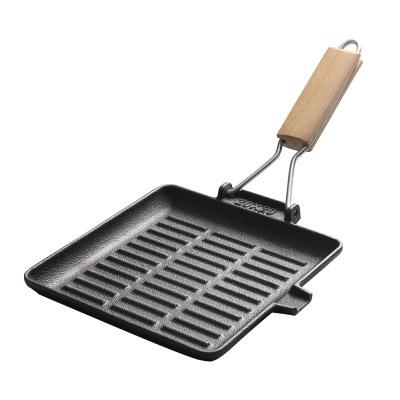 China Promotional Placeable Cast Iron Cooking Grill Pan Griddles With Wooden Handle for sale