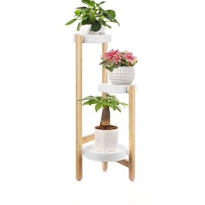 China Indoor Three-Layer Occasional Flower Balcony Living Room Floor Flower Pot Display Rack Wooden Planter Rack for sale