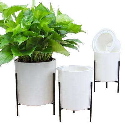 China Modern Wholesale Plastic Flower Pot Planter Pot Self Watering Plant Pot With Iron Frame for sale