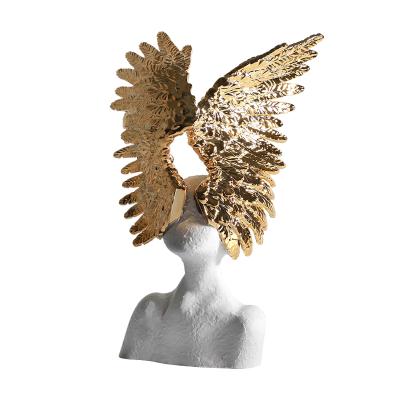 China Modern Nordic Creative Statues Artifacts Resin Sculpture Resin Angel Wings Individuality Sculpture Home Decor Luxury for sale