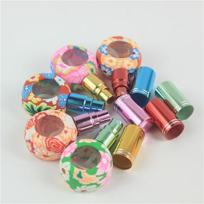 China Colorful Gift 8ml Atomizer Glass Perfume Polymer Clay Perfume Bottle for sale