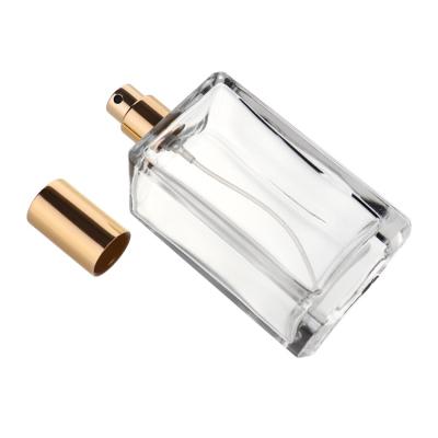 China Cosmetic Square Perfume Bottle 100ml Crimp Clear Glass Neck For Cosmetic Packaging for sale