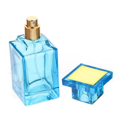 China 55ml wholesale empty blue red glass cosmetics in running perfume bottle black for perfume for sale