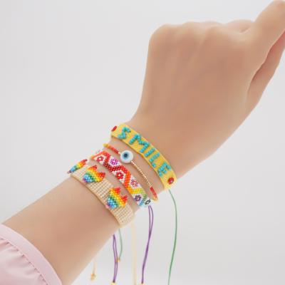 China Simple Cute Ethnic Style Miyuki Lucky Eyes Beads Rainbow Handwoven Love Beaded Bracelet for sale