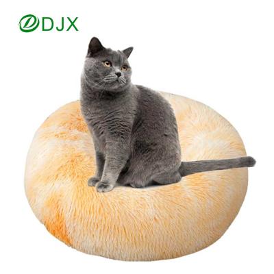 China Sustainable Comfortable Soft Dog Cat Sleeping Cushion Bed Accessories Plush Round Faux Fur Donut for sale