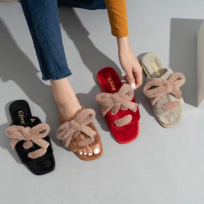 China 2021 Fashion Trend Design New Home Fur Slippers Bow Slipper Ladies Fashion Plush Flats Warm Sandals Outdoor Winter Shoes for sale