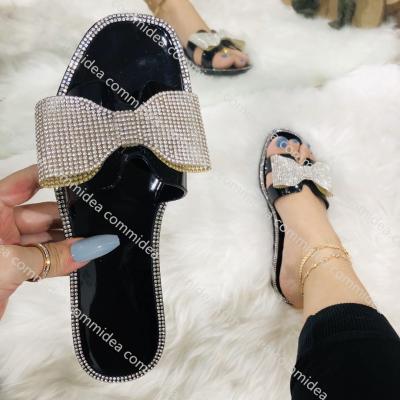 China 2022 Breathable Rhinestone Bow Outdoor Slippers Summer Women Shoes Fashion Jelly Clear Flat Beach Sandals Ladies Slippers for sale