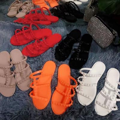 China Luxury Women Fashion Trend Shoes Luxury Women Rivet Slides Flat PVC Casual Studded Casual Ladies Flip Flop Shoes Freeze Slippers for sale