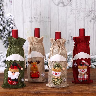 China Polyester Christmas Party Decorations Table Burlap Candy Gift Bag With Santa Claus Christmas Wine Bottle Cover Bag for sale