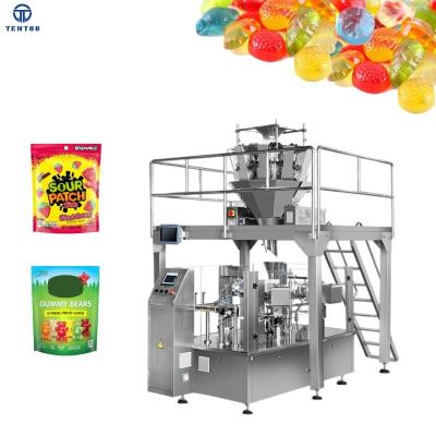 China Fully Multifunctional Food Bear Doypack Gummy Candy Packing Ziplock Stand Up Pouch Premade Bag Rotary Packaging Machine for sale