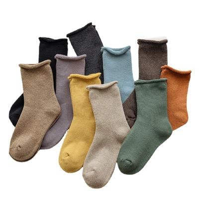 China Breathable Women Autumn Winter Korean Style Mid Tube Pure Color Thicken To Keep Warm Knit Socks Sleep Floor Socks for sale