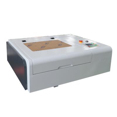 China Building Material Shops Top Quality 4040 CO2 Engraving Mini Metal Leather Laser Cutting Machine for sale