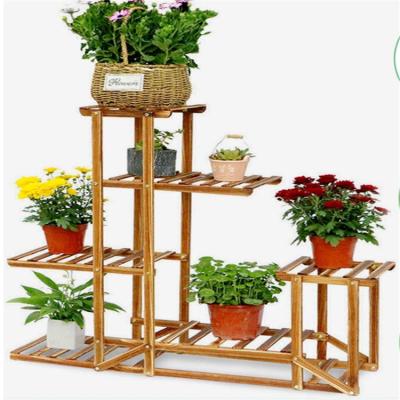 China Indoor Wooden Rack 3 Tiers Space Rack Household Plant Shelf Saving Stocked Bamboo Organizer for sale