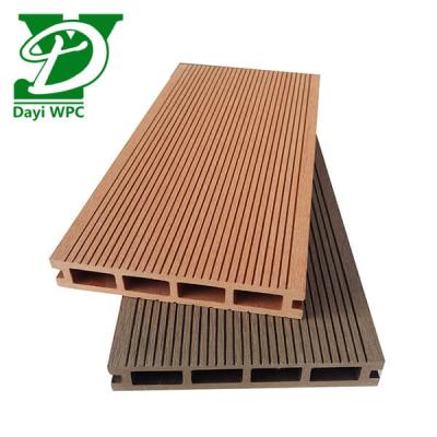 China Decking de madera de plástico compuesto resistente al agua moderno para patio en venta