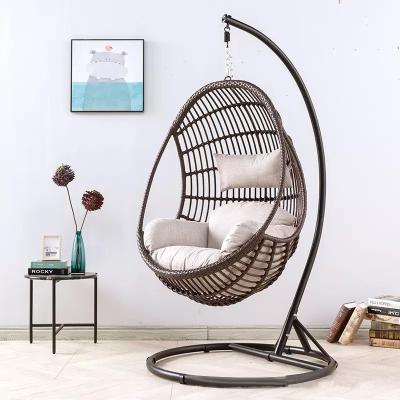 China Super Comfortable Wholesale Rattan Weave Swing Chair Egg Patio Hanging Outdoor Swing Chair With Cushion for sale