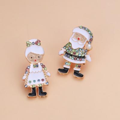 China TRENDY Christmas Santa Claus Earrings Hot Selling Alloy Diamond Asymmetrical Santa Grandpa and Grandma Stud Earrings for sale