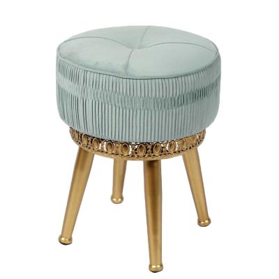 China Modern High Quality Tufted Home Furniture Round Small Ottoman Ottoman Stool With Gold Metal Iron Legs for sale