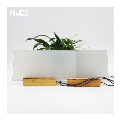 China 124*175mm electrochromatic glass sliding window smart switchable pdlc film for sale