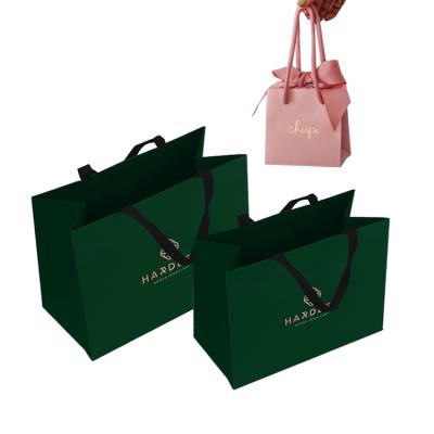 China Custom Logo Color Brand Luxury Boutique Wholesale Recyclable Wrapping Paper Gift Shopping Bags for sale