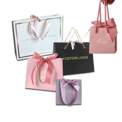 China Cheap Wholesale Recyclable Mini Small Price Recyclable Custom Logo Fancy Wedding Favor Wedding Favor Door Paper Gift Bag White With Ribbon Handles for sale